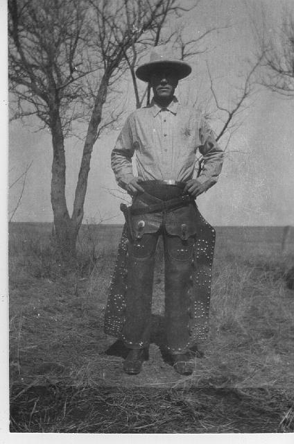 harvey_bowles_badge_1927.jpg - James "Harvey" Harvey Bowles Jr.; notice the badge pinned to the left side of his shirt; his leather riding chaps were given to him by his brother Robert Vincent Bowles; photo taken in 1927
